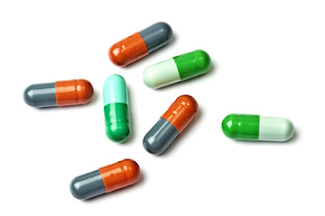 Image showing A few colorful capsules isolated on white 