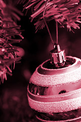 Image showing Christmas ornaments on tree.