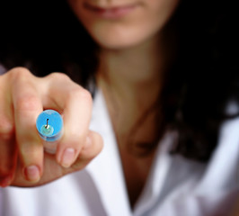 Image showing Portrait of a young doctor with syringa.