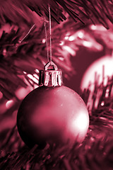 Image showing Christmas ornaments on tree.