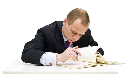 Image showing Studying businessman