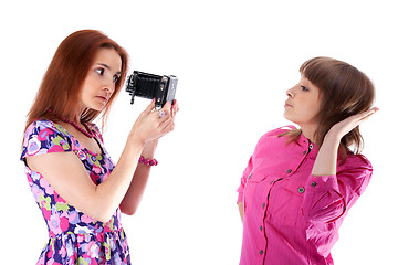 Image showing Two beautiful girls to pose