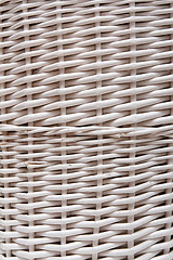 Image showing Braided basket in the manner of background