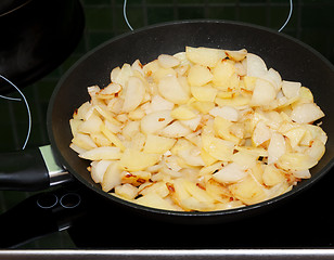 Image showing Fried potatoes in pan