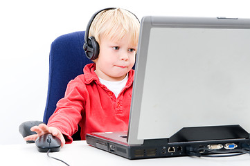 Image showing Boy behind a laptop