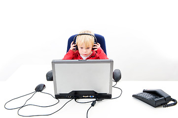 Image showing Boy behind a laptop