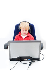 Image showing Boy behind a laptop