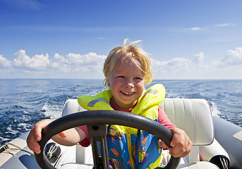 Image showing Young helmsman