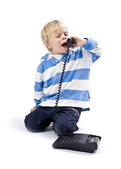 Image showing Small boy on the phone