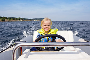 Image showing Young helmsman