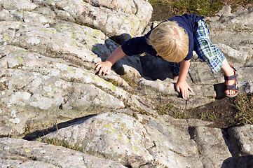 Image showing Climbing boy