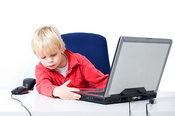 Image showing Boy working on a laptop