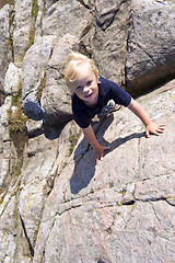 Image showing Climbing boy