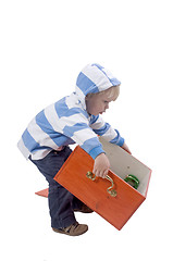Image showing Boy lifting box