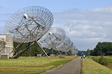 Image showing Eleven Radio Telescopes in a row