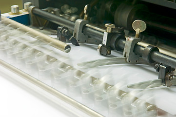 Image showing Sheet feeder in motion