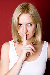 Image showing woman with finger on lips