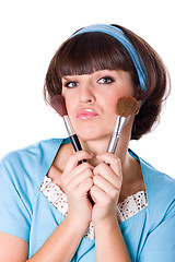 Image showing woman with two make-up brushes 