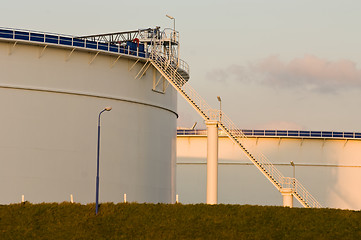 Image showing Oil tanks in the evening light