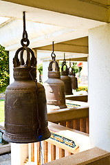 Image showing Old bells in a buddhist temple of Thailand