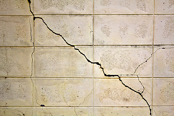 Image showing Pronounced crack in a wall running diagonally with extra texture