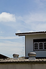 Image showing Ventilation pipes on a roof