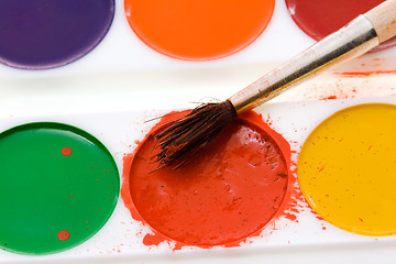 Image showing Paints and a brush