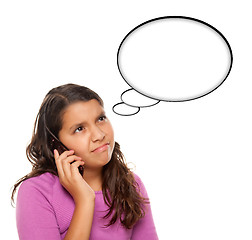 Image showing Frowning Hispanic Teen Aged Girl on Phone with Blank Thought Bub