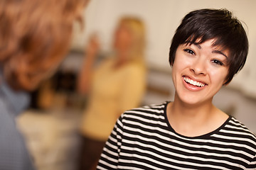 Image showing Laughing Young Woman Socializing