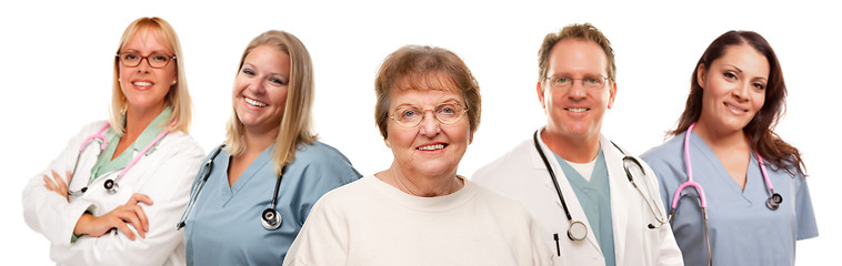 Image showing Smiling Senior Woman with Medical Doctors and Nurses Behind