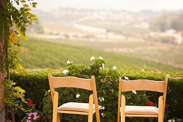 Image showing Patio Chairs Overlooking the Country