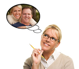 Image showing Beautiful Woman with Thought Bubbles of Herself and A Guy