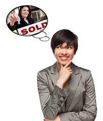 Image showing Multiethnic Woman with Thought Bubbles of Agent Handing Over Key