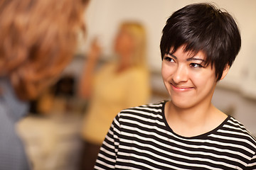 Image showing Smiling Young Woman Socializing