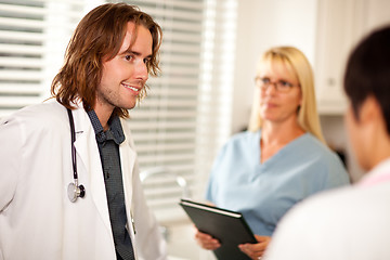 Image showing Doctors and Nurses Having Conversation