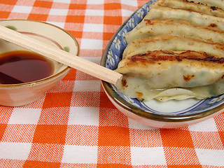 Image showing Gyoza and soy sauce