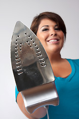 Image showing Woman Holding an Iron