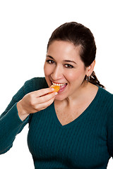 Image showing Eating mandarin orange slice