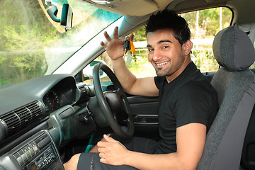 Image showing Happy male driver holding car keys