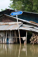 Image showing Road sign in flooded village in Thailand