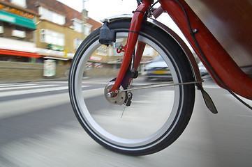 Image showing Spinning bicycle wheel