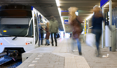 Image showing Catching a train