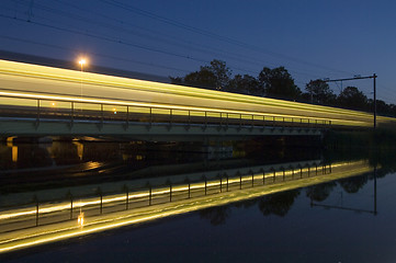 Image showing Reflection of a passing train