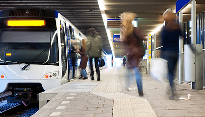 Image showing Catching a train