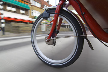 Image showing Spinning bicycle wheel