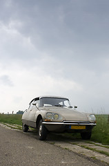 Image showing Vintage car on Dutch Dyke