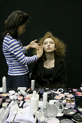 Image showing Fashion model having her makeup done