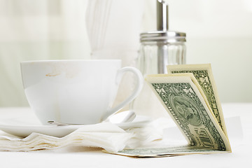 Image showing Dollars in payment for coffee