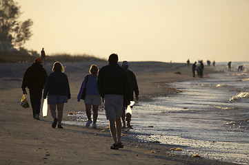 Image showing Early morning avid shell hunters