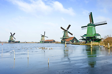 Image showing Four windmills